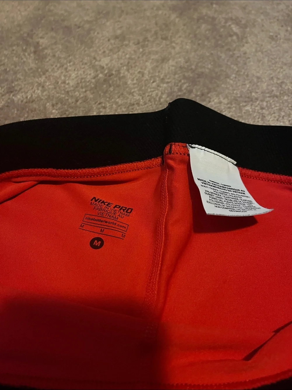 Nike Pro Women's Red Training Shorts with Black Waistband